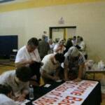 Our class signing up for class photo... Sandy Swank (standing in middle with white top)