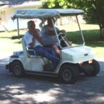 Ron Albright & Tracy Galvin on golf cart at Tiger Trot 2010